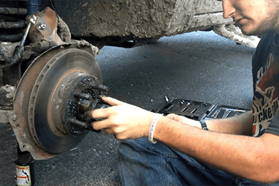 DIY mechanic replacing a wheel hub